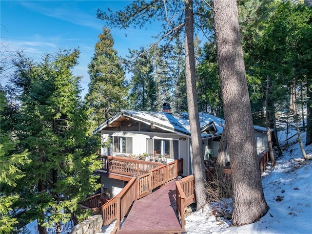 view of snow covered property