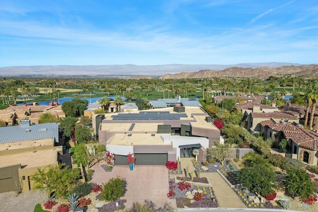 birds eye view of property featuring a mountain view