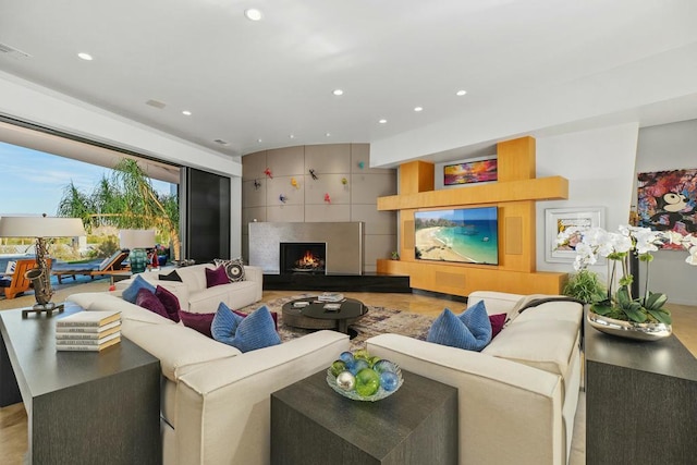 living room with light hardwood / wood-style flooring