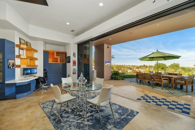 dining room with built in desk