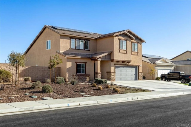 view of front of home with a garage