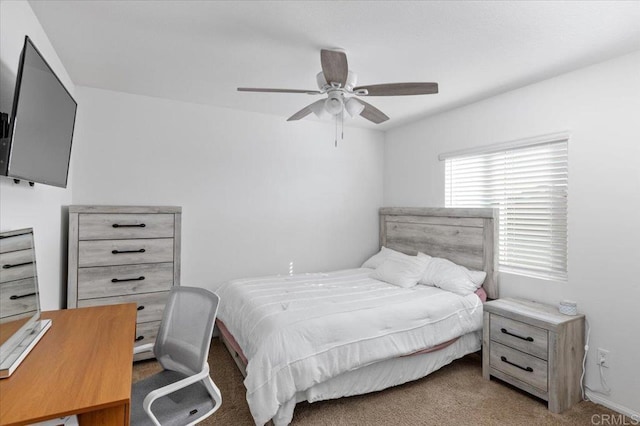 bedroom featuring light colored carpet and ceiling fan