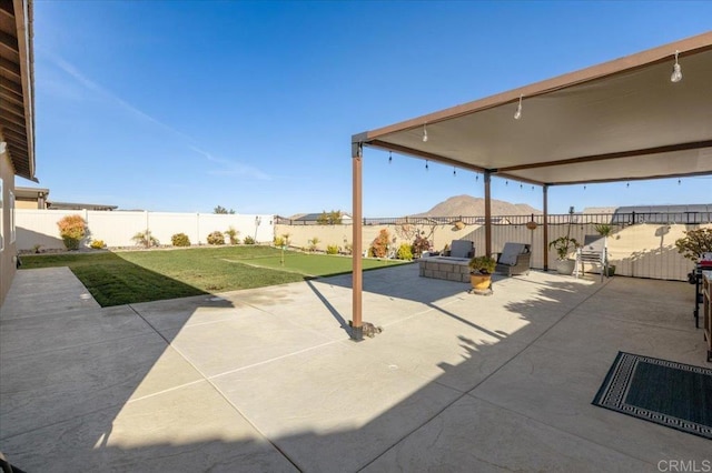 view of patio with a mountain view