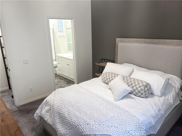 carpeted bedroom featuring ensuite bathroom