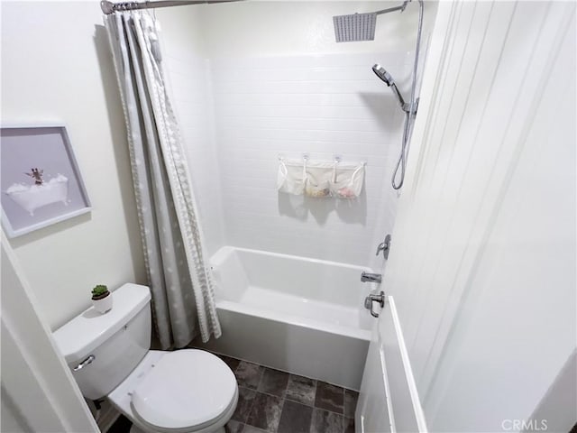 bathroom with shower / bath combo with shower curtain and toilet