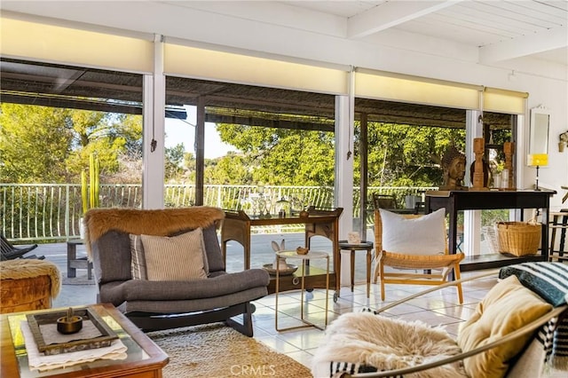 sunroom with wood ceiling and beam ceiling