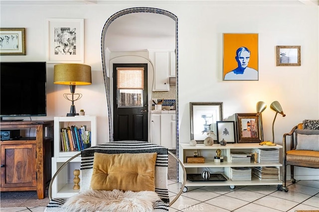 sitting room featuring light tile patterned floors