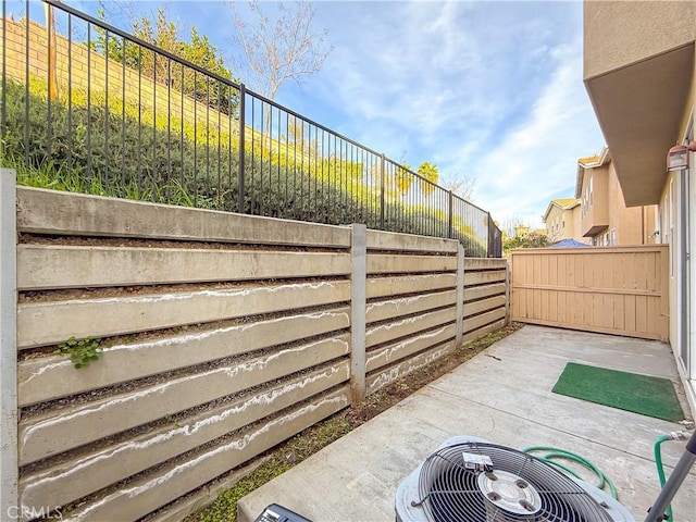 view of patio / terrace with central AC