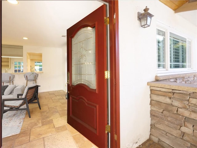 doorway to property featuring a porch