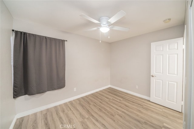 unfurnished room with light hardwood / wood-style floors and ceiling fan