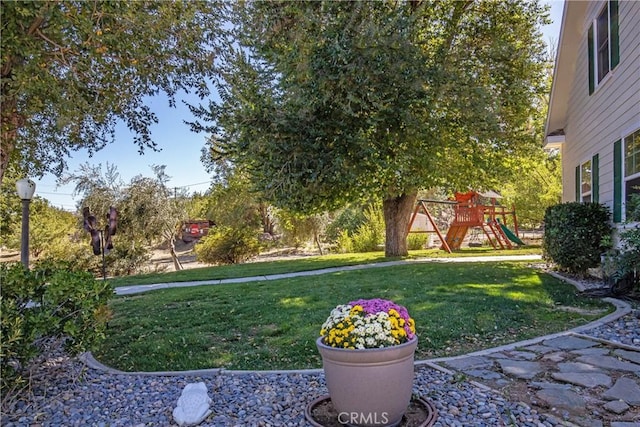 view of yard with a playground