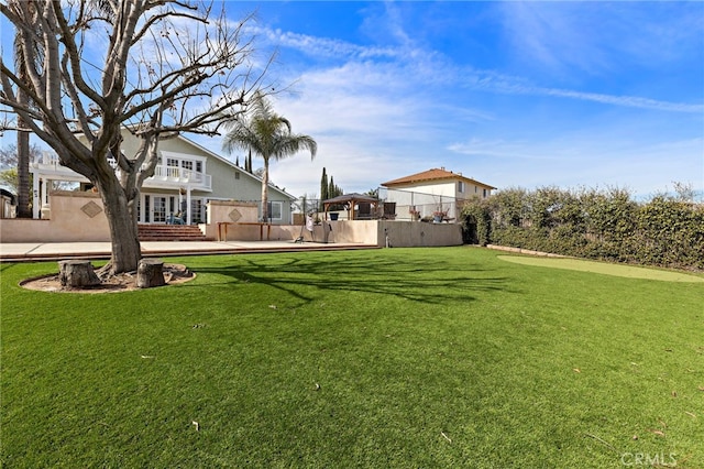 view of yard featuring fence