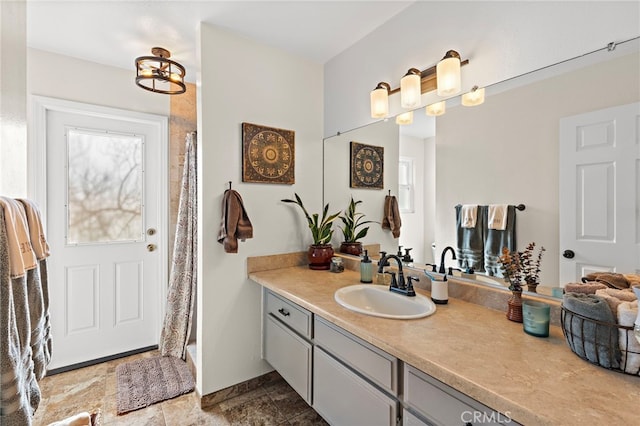 full bath with curtained shower and vanity