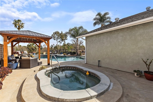 view of pool featuring a fenced in pool, a patio, outdoor lounge area, a gazebo, and an in ground hot tub