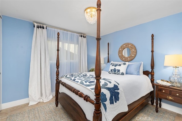 bedroom featuring wood-type flooring