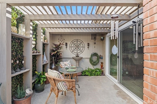 view of patio featuring a pergola