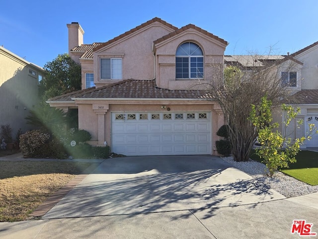 view of front of home with a garage