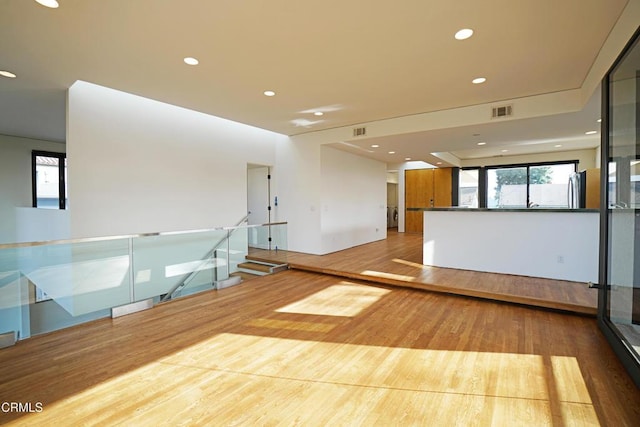 unfurnished room featuring light wood-type flooring