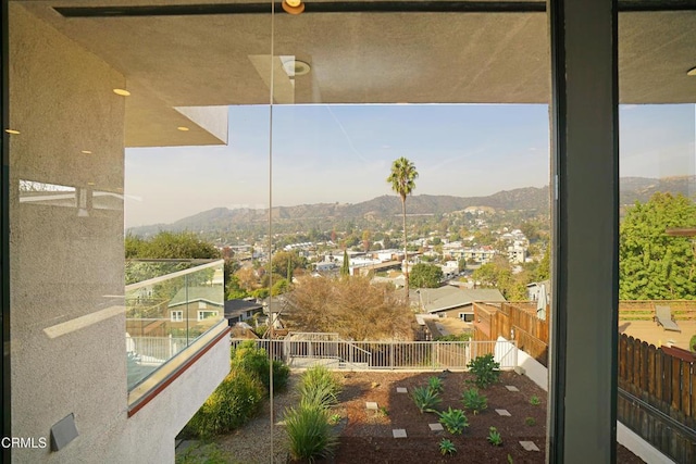 balcony featuring a mountain view