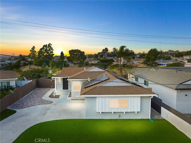 view of front of home with a lawn