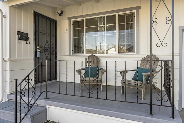 doorway to property featuring covered porch