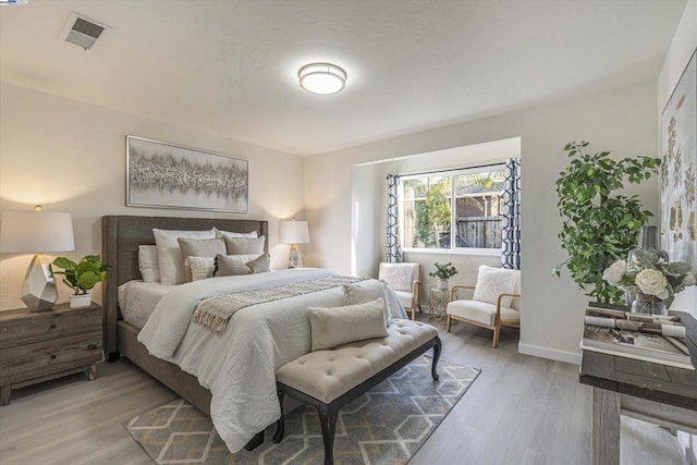 bedroom featuring light hardwood / wood-style floors