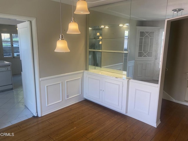 unfurnished dining area with dark hardwood / wood-style flooring