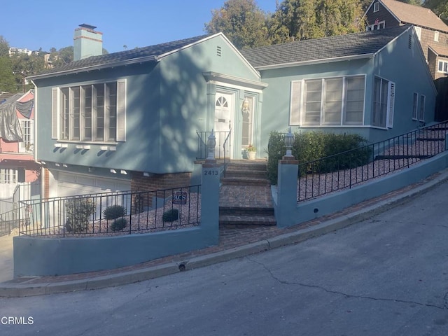 view of front of house with a garage