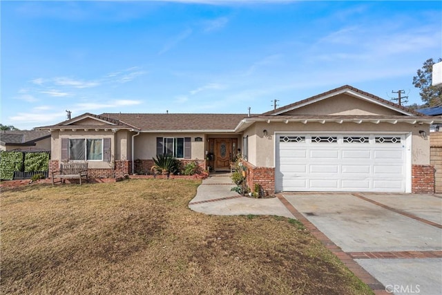 ranch-style home with a garage, brick siding, driveway, and stucco siding