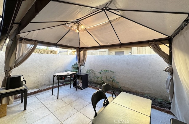 view of patio / terrace featuring a gazebo