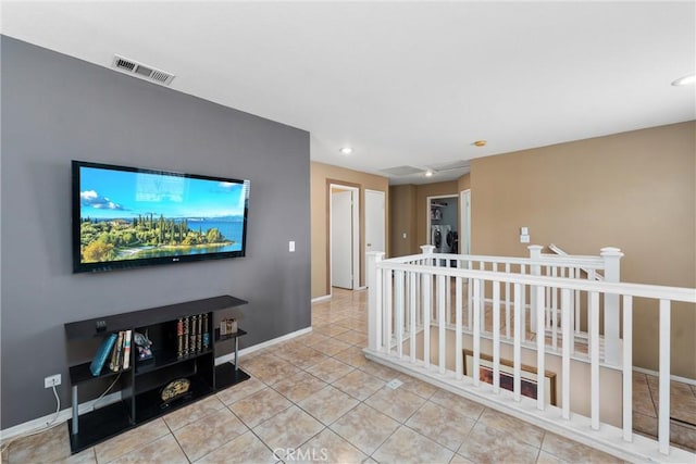 living room featuring light tile patterned flooring