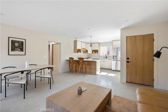 living room featuring sink