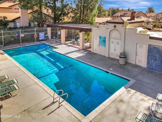 view of pool featuring a patio