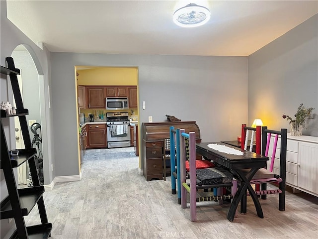 dining room with light hardwood / wood-style flooring