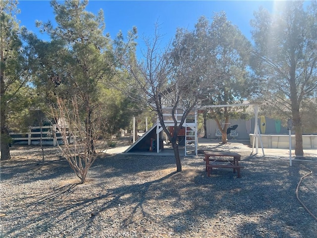 view of yard featuring a playground