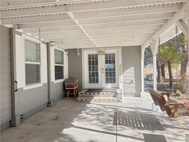 view of patio / terrace featuring french doors