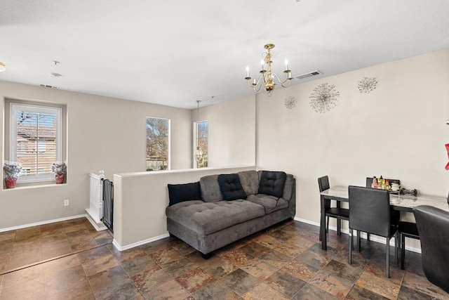 living room with an inviting chandelier