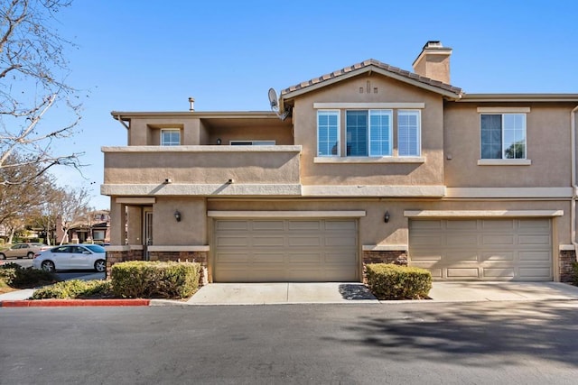 view of property featuring a garage