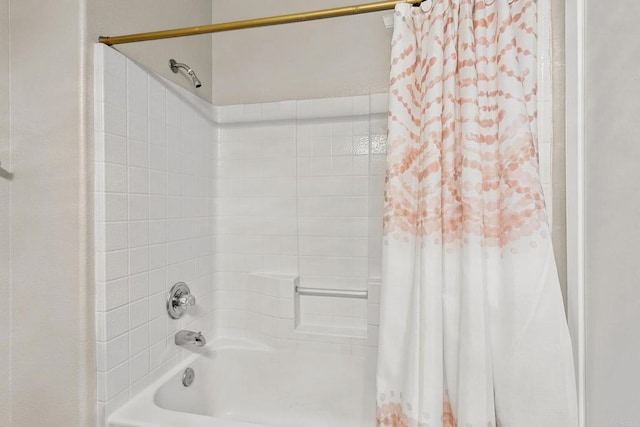 bathroom featuring shower / bathtub combination with curtain