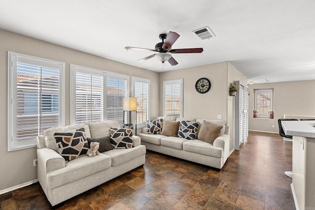 living room with ceiling fan