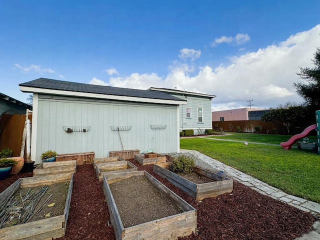 view of outbuilding with a lawn