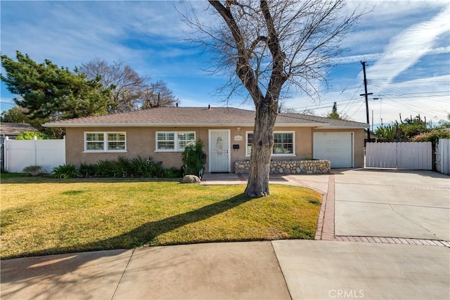 ranch-style home with a garage and a front yard