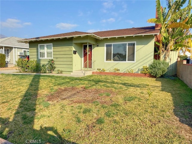 view of front of property with a front lawn