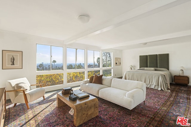 bedroom featuring beam ceiling