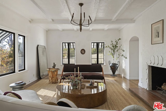 living room featuring hardwood / wood-style floors and beam ceiling