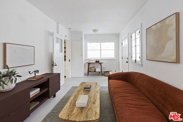 living room featuring light tile patterned flooring