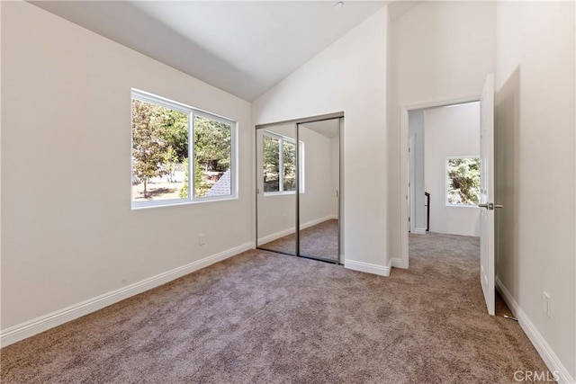 370 Auburn Dr, Lake Arrowhead, CA 92352 - unfurnished bedroom featuring carpet floors, lofted ceiling, and a closet