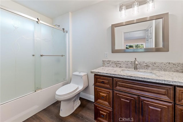 370 Auburn Dr, Lake Arrowhead, CA 92352 - bathroom featuring wood finished floors, vanity, and shower / bath combination with glass door