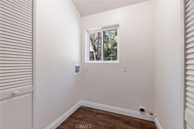 washroom with washer hookup and dark hardwood / wood-style flooring