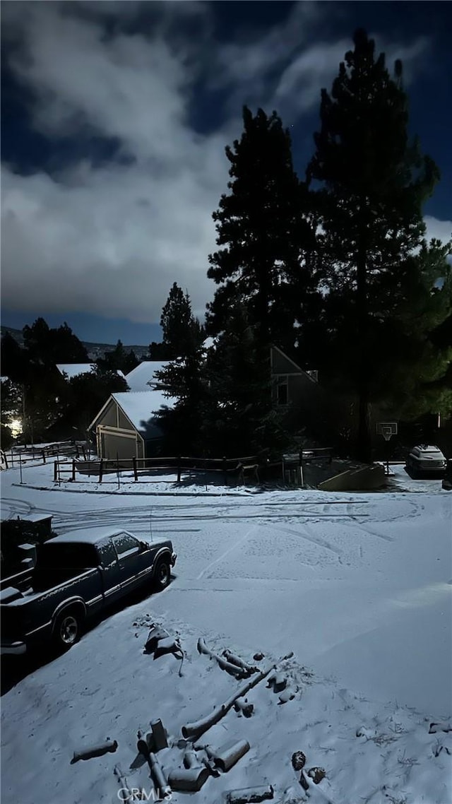 view of yard covered in snow